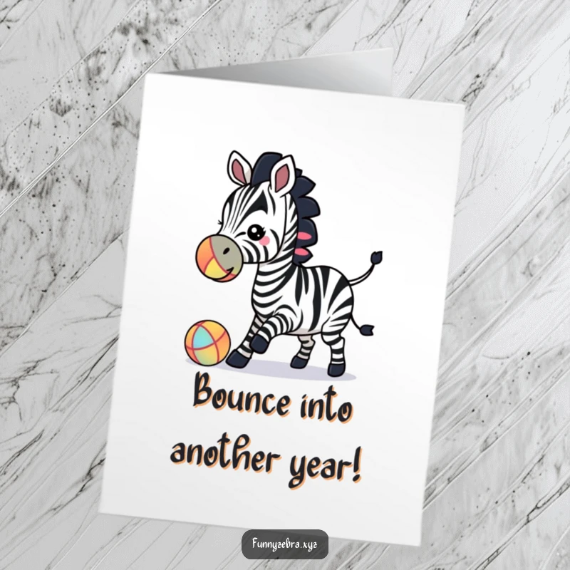 Funny Free Printable Birthday Card: Zebra silhouette playfully bouncing a colorful ball with its nose, wishing happy birthday.